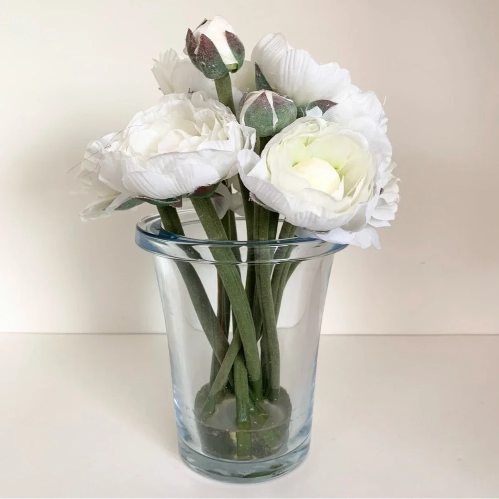 Thomas O’Brien Faux flowers in blue glass vase